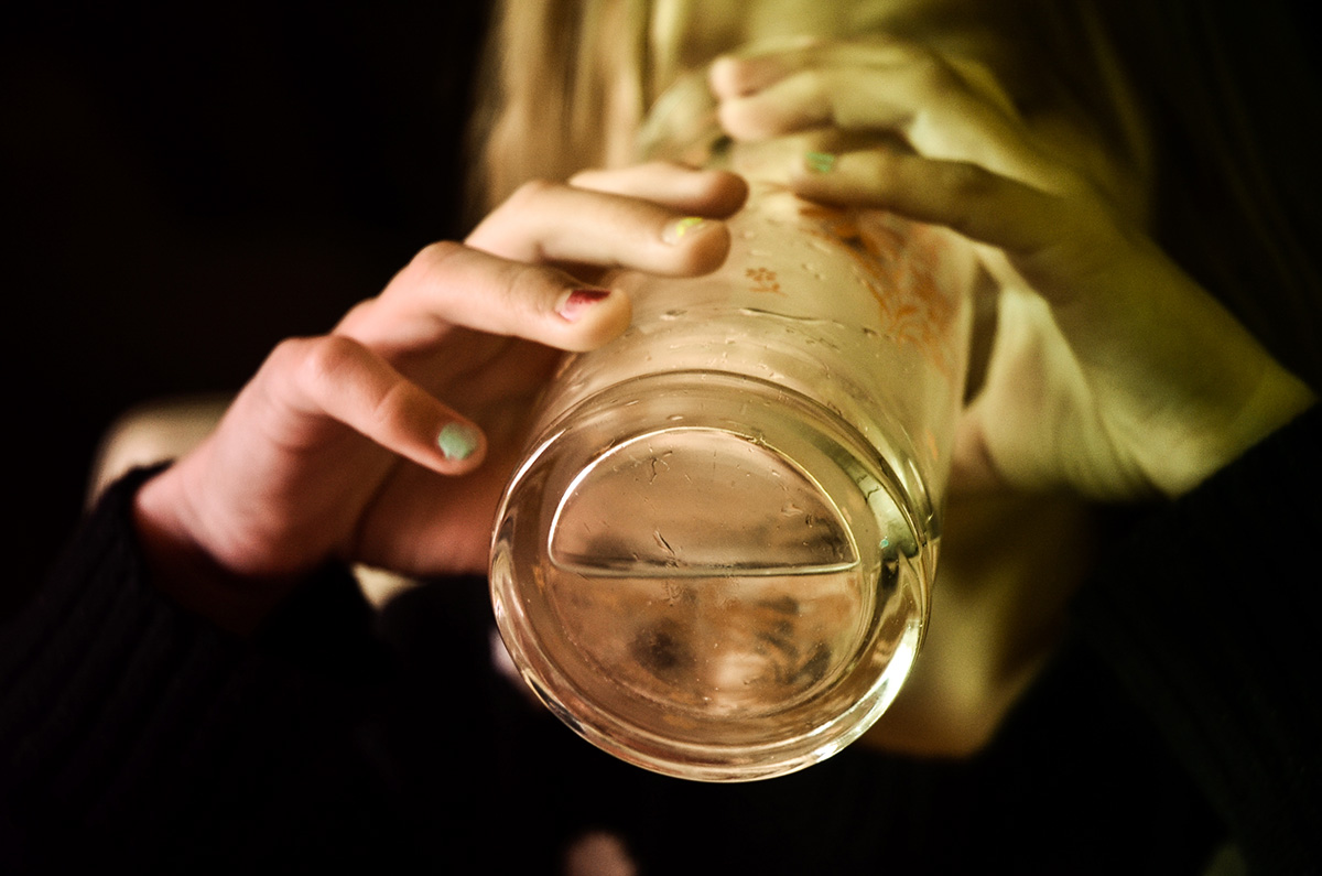 drinking a glass of water